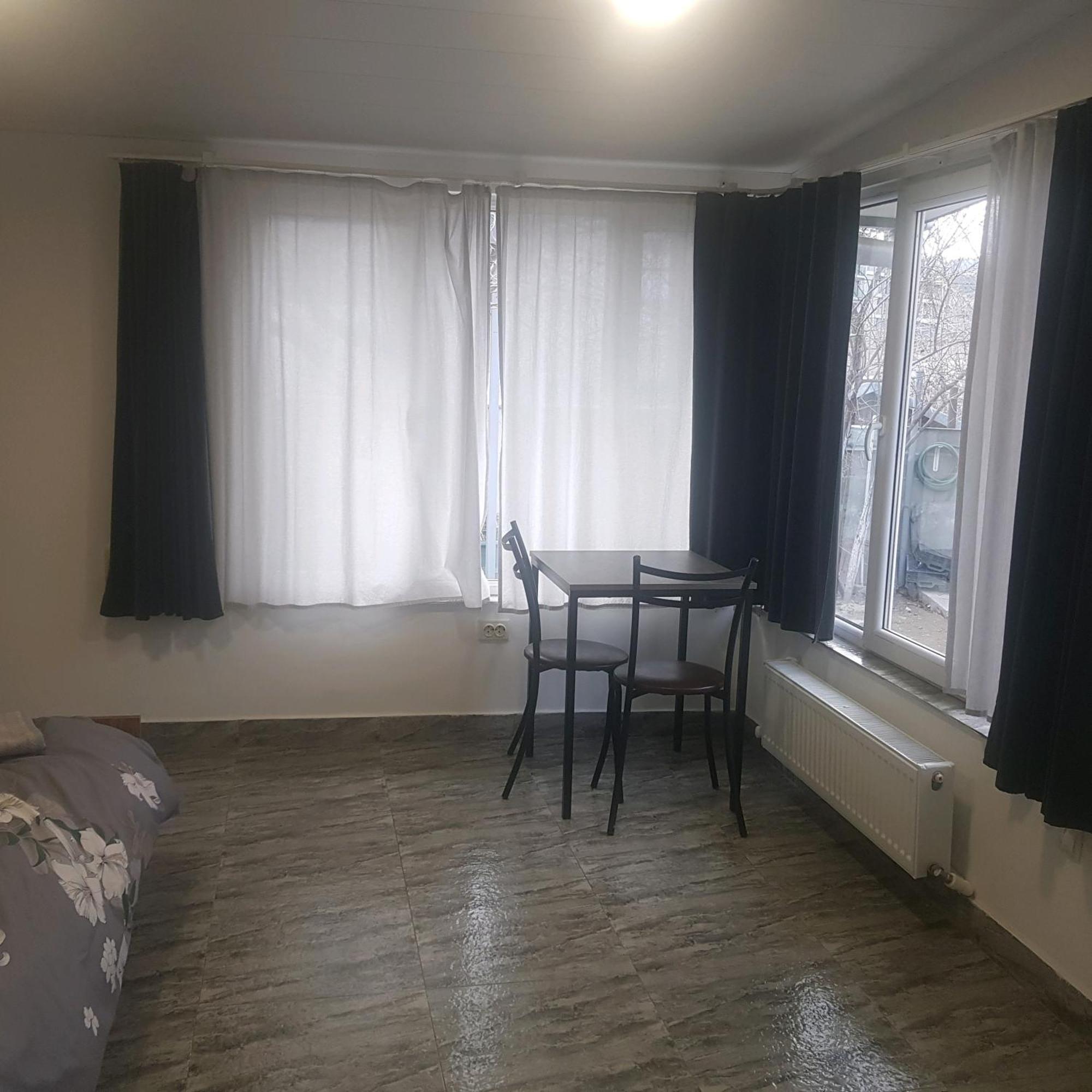 Hotel Домик У Куры Tbilisi Esterno foto