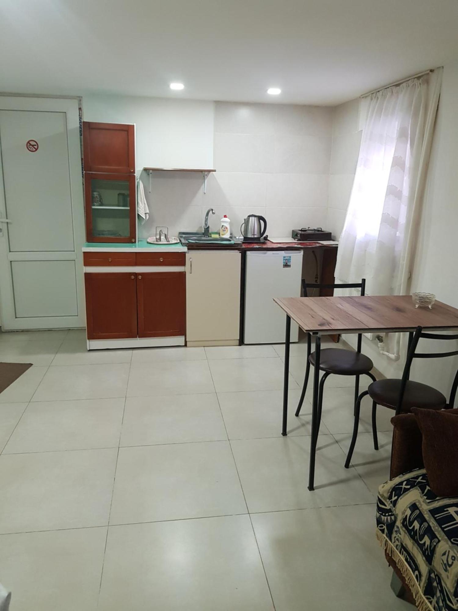 Hotel Домик У Куры Tbilisi Esterno foto